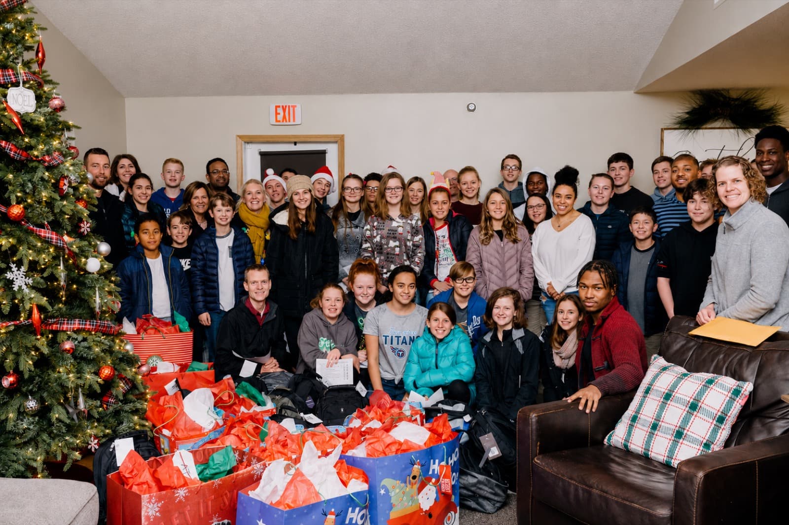 A large gathering at House of Compassion — the community that makes the work possible.